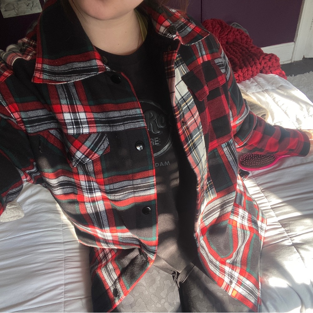 Brand new Alexander McQueen flannel jacket lined in black fur.